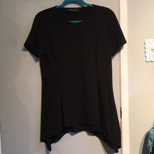 Crew neck peplum style top